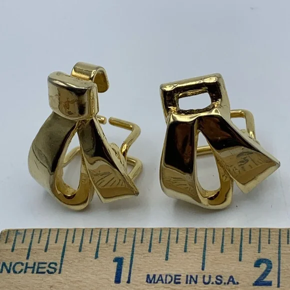 Sculptural 1979 Mimi Di N Signed Bow belt buckles